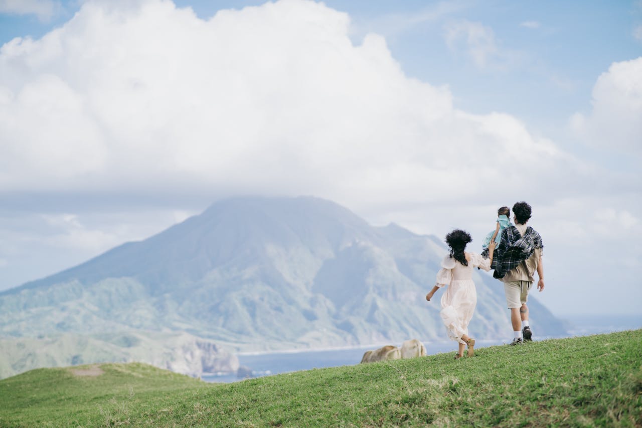 parents hiking with young child